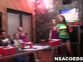 Two amateur college babes sucking cock at a party